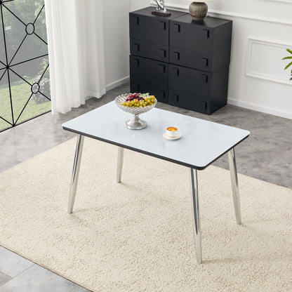 Modern minimalist rectangular dining table, suitable for 4-6 people. Tempered glass countertop+lower MDF board,imitation marble texture, silver metal tapered legs. Suitable for minimalist restaurants.