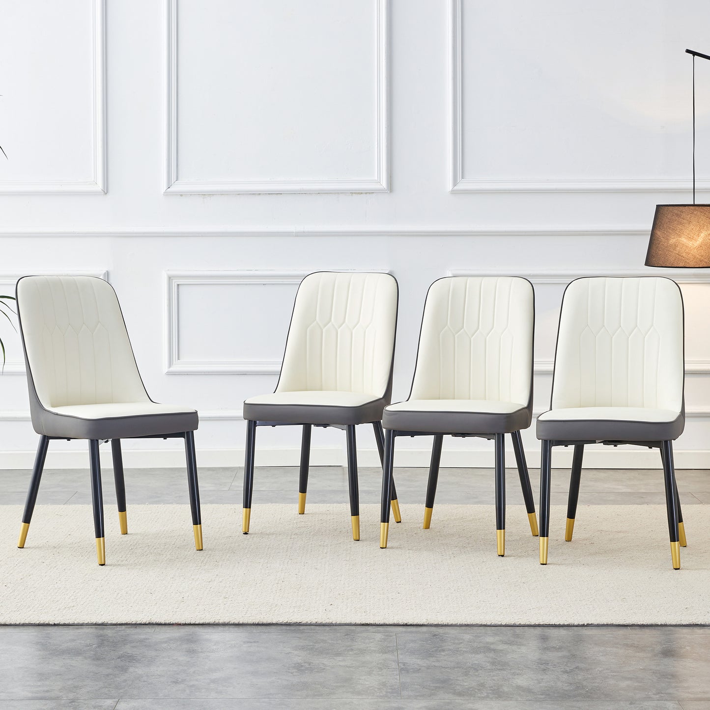 A modern dining chair with a white dark gray dual tone PU leather backrest and black metal legs, suitable for kitchens, bedrooms, and offices. A set of 4 pieces (white+dark gray+PU)C-007