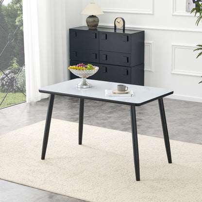 Modern minimalist rectangular dining table, suitable for 4-6 people. Tempered glass countertop+lower MDF board, imitation marble texture, black metal tapered legs. Suitable for minimalist restaurants.